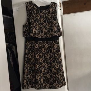 Beige and black lace dress